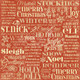One side is red with various Christmas words in cream