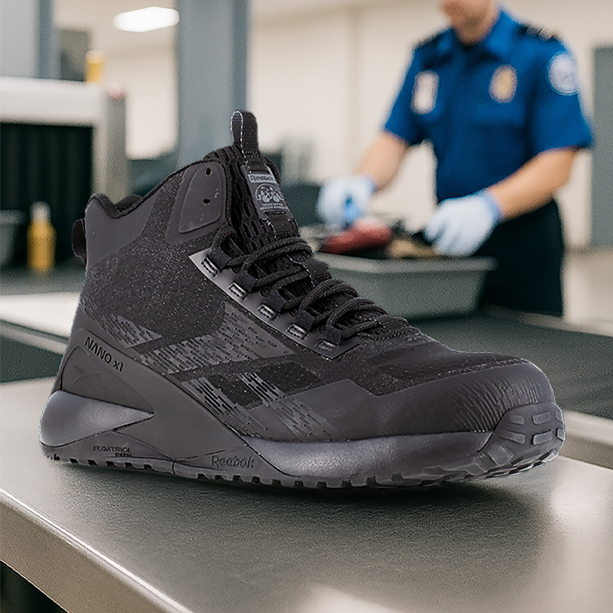metalfree-airportsecurity-square.jpg Reebok metal free work shoes on a metal table with a security checkpoint in the background