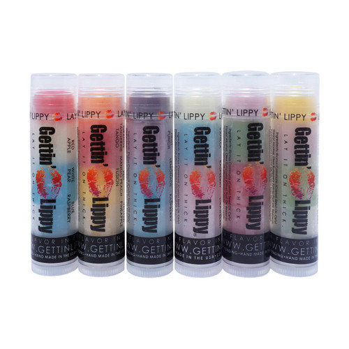 Chatty 6 Pack – 18 Flavors, One Sassy Conversation Starter!

Get your lips talking with the Gettin Lippy Chatty 6 Pack!
This colorful collection of six 3-layered lip balms delivers 18 delicious flavors that will leave your lips silky smooth and your senses completely spoiled. Each tube features a trio of fun, fruity, and fabulous flavors that apply clear while packing a punch of hydration.

Whether you’re treating yourself or sharing with friends, these balms are perfectly pocket-sized, ultra-moisturizing, and totally addictive. Say goodbye to boring balm and hello to the best lip balm trio experience ever created!

Flavors Included in the Chatty 6 Pack:

Berry Orchard Bliss – Red: Apple, White: Pear, Blue: Raspberry

Tropical Tango Trio – Orange: Tangerine, Red: Mango Peach Fusion, Yellow: Pineapple

Berry Blush Punch – Purple: Fruit Punch, Pink: Pink Lemonade, Blue: Raspberry

Berry Sweet Bliss – White: Vanilla, Blue: Raspberry, Pink: Strawberry

Fruit Salad Smooch – Pink: Watermelon, Green: Apple, Red: Strawberry

Juicy Orchard Medley – Yellow: Mango, Pink: Peach, Green: Pear Berry

All balms apply clear to lips — color is just for flavor layers!

Why You'll Love It:

18 unique flavor experiences in 6 colorful tubes

Hydrating & long-lasting moisture without the stickiness

Made with natural ingredients like castor oil, olive oil, beeswax, and soybean lipids

Alcohol-free, paraben-free, phthalate-free, and cruelty-free

Safe for all skin types: dry, oily, sensitive, or combination

Satin finish that looks smooth on everyone

Fun gift idea for birthdays, holidays, party favors, or teen spa nights

Pairs perfectly with our Lip Balm Holders and Safety Keychain Wristlets

Proudly made in the USA!

Bonus Benefits:

Save when you buy as a bundle!

Anti-aging mineral properties help nourish and condition lips

Convenient, colorful, and full of personality — just like your customers!

MADE IN THE USA!!