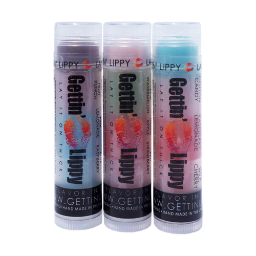 Feisty Flavors 3-Pack – 9 Flavors of Fun in One Sassy Set!

Bold, Bright & Bursting with Flavor! Meet the Feisty Flavors 3-Pack from Gettin Lippy — a trio of our best-selling, 3-layered lip balms that bring you 9 unique flavors in one fun-filled bundle! Each balm delivers silky moisture and juicy flavor, and while the colors are bold and playful, the balm always applies clear and smooth to the lips.

This value-packed trio includes:

What’s Inside:

Berry Blush Punch – Purple: Fruit Punch, Pink: Pink Lemonade, Blue: Raspberry

Fruit Salad Smooch – Pink: Watermelon, Green: Apple, Red: Strawberry

Berry Sweet Treat – Blue: Cotton Candy, Pink: Raspberry Lemonade, Red: Cherry

That’s 9 delicious fruity flavors to experience solo or share with friends. Whether you're tossing one in your purse, backpack, or gifting to someone special, this trio is as fun as it is functional.

Bonus: Save $1.00 when you grab this 3-pack vs buying individually!

Pairs Perfectly With:

Lip Balm Holders – Keep your balm handy & stylish

Safety Keychain Wristlets – For fun + function on the go

Why You'll Love It:

3 lip balms × 3 flavors each = 9 layers of flavor fun

Ultra-moisturizing, non-sticky, and long-lasting formula

Applies clear, no matter the color of the tube

A must-have gift set for birthdays, holidays & party favors

Made proudly in the USA

Pro Tip:

Stock up and save with a few sets — perfect for friends, classrooms, bridal/baby showers, or care packages!

MADE IN THE USA!!