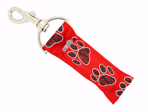 Lip Balm Holder Zebra Red with Black Paw Prints  

Zebra Red with Black Paw Prints lip balm holder! This beautiful Lip Balm or Chapstick Holder is HANDMADE with a high-quality materials! Our unique design and clasp offer both style and functionality. The hook is on a swivel head so the lip balm always falls back down and never gets stuck upside down, this is where most lip balm holders lose your lip balm or chapstick! This lip balm holder is designed to snuggly fit any standard lip balm or chapstick. Make sure your lip balm or chapstick will not get lost and grab one of these! 

BENEFITS: Misplacing or Losing your chapstick is the worst!! Don’t let that happen again and buy the perfect solution! Our Lip Balm / Chapstick Holder Keychain will make sure you always have your Gettin Lippy lip balm at hand when desperately needed. Our cute fun designs will compliment anything. Attach it to your keys, lanyard, back-pack, bag, purse, or anywhere your little heart desires with our easy open clasp! 

PERFECT GIFTS: A simple gift can go a long way. Everyone needs something cute and functional. Buy now for stocking stuffers, birthday party, a team gift or for a daughter, friend, wife, girlfriend, colleague, student, teacher, etc! 

BUY WITH CONFIDENCE: Read the reviews! Our Gettin Lippy Lip balm holders are the number one rated lip balm holders on the market! If you don’t LOVE our product, we offer 100% Money Back GUARANTEE no questions asked. 

PACKAGE INCLUDES:  1 Unique Lip Balm / Chapstick holder. Each Holder is 6.5 inches (with hook) x 1.5 inches. **NOTE: Gettin Lippy lip balms in pictures are not included but click on the link below and get the best multi-flavored lip balm on the market:   https://gettinlippy.com/gettin-lippyoriginal-line/   

HANDMADE IN THE USA!! 