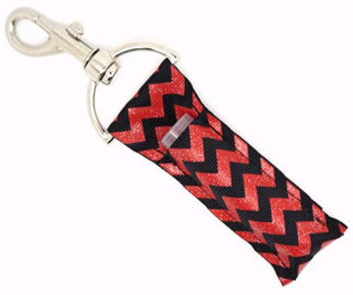 Lip Balm Holder Black with Red Glitter Chevron

Black with Red Glitter Chevron lip balm holder! This beautiful Lip Balm or Chapstick Holder is HANDMADE with a high-quality materials! Our unique design and clasp offer both style and functionality. The hook is on a swivel head so the lip balm always falls back down and never gets stuck upside down, this is where most lip balm holders lose your lip balm or chapstick! This lip balm holder is designed to snuggly fit any standard lip balm or chapstick. Make sure your lip balm or chapstick will not get lost and grab one of these! 

BENEFITS: Misplacing or Losing your chapstick is the worst!! Don’t let that happen again and buy the perfect solution! Our Lip Balm / Chapstick Holder Keychain will make sure you always have your Gettin Lippy lip balm at hand when desperately needed. Our cute fun designs will compliment anything. Attach it to your keys, lanyard, back-pack, bag, purse, or anywhere your little heart desires with our easy open clasp!

PERFECT GIFTS: A simple gift can go a long way. Everyone needs something cute and functional. Buy now for stocking stuffers, birthday party, a team gift or for a daughter, friend, wife, girlfriend, colleague, student, teacher, etc!

BUY WITH CONFIDENCE: Read the reviews! Our Gettin Lippy Lip balm holders are the number one rated lip balm holders on the market! If you don’t LOVE our product, we offer 100% Money Back GUARANTEE no questions asked.

PACKAGE INCLUDES:  1 Unique Lip Balm / Chapstick holder. Each Holder is 6.5 inches (with hook) x 1.5 inches. **NOTE: Gettin Lippy lip balms in pictures are not included but click on the link below and get the best multi-flavored lip balm on the market: https://gettinlippy.com/gettin-lippyoriginal-line/ 

HANDMADE IN THE USA!!