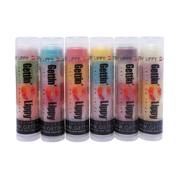Gabby 6 Pack – 18 Flavors of Fun for the Lip Balm Obsessed!

Get your lips talking with the Gettin Lippy Gabby 6 Pack!
This playful and colorful bundle features six 3-layered lip balm tubes, each bursting with a trio of delicious flavors. That’s right — 18 different lip-loving flavors in one gift-worthy set!

Each tube is a journey of flavor, starting with one layer and blending smoothly to the next. Whether you’re hydrating dry lips or just craving a burst of fruity fun, the Gabby Pack has your back (and your balm). Plus, all tubes apply clear and glide on with a smooth, satin finish you’ll absolutely love.

Perfectly portable and full of sass, these balms also pair beautifully with our Lip Balm Holders and Safety Keychain Wristlets — making them your new favorite must-have!

Flavors Included in the Gabby 6 Pack:

Sweet & Juicy Summer – Pink: Peach, Green: Watermelon, Orange: Tangerine

Berry Sweet Treat – Blue: Cotton Candy, Pink: Raspberry Lemonade, Red: Cherry

Harvest Kisses – Red: Apple, Yellow: Peach, Orange: Pumpkin

Sunkissed Splash – Yellow: Pineapple, Blue: Cherry, Pink: Pink Lemonade

Island Kiss – Purple: Pina Colada, White: Vanilla Icing, Red: Strawberry

Tropical Kiss Bliss – White: Coconut, Pink: Raspberry, Yellow: Pina Colada

All tubes apply clear — the colors just let you know which flavor comes next!

Why You'll Love the Gabby 6 Pack:

18 flavors across 6 tubes for endless variety

Ultra-hydrating, non-sticky formula

Natural ingredients like olive oil, castor oil, and beeswax

Cruelty-free, paraben-free, phthalate-free, and alcohol-free

Safe for all skin types — from dry to sensitive

Great gift for tweens, teens, moms, teachers, or your besties

Perfectly pairs with our Lip Balm Holders & Safety Wristlets

Proudly made in the USA!

Bonus Benefits:

Long-lasting hydration with every swipe

Anti-aging minerals to nourish and smooth lips

Fun for all ages — from spa parties to stocking stuffers

A great value compared to buying individual tubes

MADE IN THE USA!!