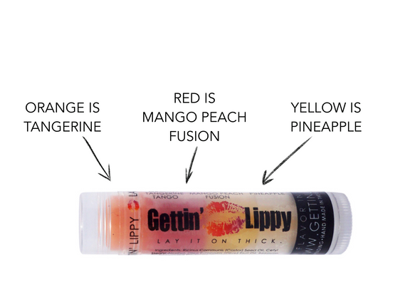 Tropical Tango – Tangerine, Mango Peach Fusion & Pineapple Lip Balm

Get ready to tango with the tropics! Our Tropical Tango Trio lip balm by Gettin Lippy brings a splash of fruity flavor to your everyday lip care. This three-layer lip balm is bursting with Tangerine, Mango Peach Fusion, and Pineapple—designed to keep your lips soft, smooth, and deliciously kissable.

Each vibrant layer has a unique scent and taste that transitions as you use it—keeping your lips (and senses) excited! While the colors are fun and fruity, rest assured that every layer applies clear to your lips.

Whether you’re heading to the beach or just dreaming of one, this tropical lip balm is a must-have. And don’t forget—it pairs perfectly with our lip balm holders and safety keychain wristlets for easy, everyday access!

Flavors in This Lip Balm:

Orange: Tangerine

Red: Mango Peach Fusion

Yellow: Pineapple

Why You'll Love It:

Three tropical flavors in one lip balm

Smooth, clear application—no tint

Deeply moisturizing, never sticky

Fun, layered design that’s great for gifting

Perfect for tropical parties, spa day favors, and stocking stuffers

Buy More & Save — Available in packs to share the sunshine!

Pairs Perfectly With:

Lip Balm Holders – Clip to your keys or purse

Safety Keychain Wristlets – Keep your essentials secure & stylish

MADE IN THE USA!!