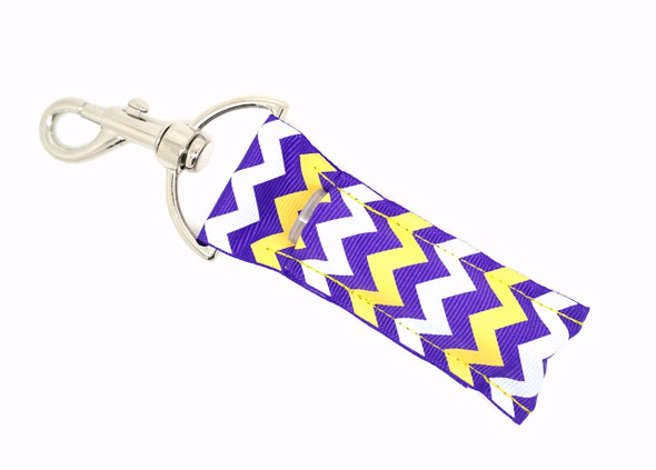 Sunset Stripes Purple Chevron Lip Balm Holder ~ Lippy Clip Keychain

Brighten your day with Sunset Stripes—a bold and playful lip balm holder featuring a vibrant purple background with alternating yellow and white chevron stripes. This design bursts with personality and sunshine, keeping your favorite balm stylish and close at hand wherever you go.

Whether you clip it to your keys, backpack, or purse, this vibrant lippy clip adds flair and function to your daily routine.

Why You’ll Love It:


Purple background with fun yellow and white chevron stripes

Fits most standard lip balm tubes, chapstick, and more

Silver lobster clasp easily attaches to bags, keys, and zippers

Handmade with high-quality printed fabric

Bright, bold gift for chevron lovers, teachers, or teens

Product Details:


Design: Purple background with yellow & white chevron pattern

Material: High-quality printed fabric

Clip: Silver lobster clasp

Fits: Standard lip balm tubes (not included)

Includes: 1 Sunset Stripes lip balm holder

Handmade by Gettin Lippy in the USA