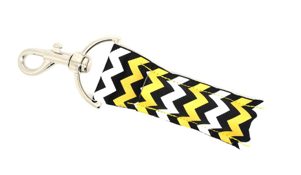 Buzz Bold Lip Balm Holder ~ Black Yellow White Chevron Lippy Clip Keychain

Make a bold and bright statement with Buzz Bold—a high-contrast lip balm holder featuring a sleek black background with alternating yellow and white chevron stripes. This eye-catching combo gives off energetic, edgy vibes and adds a punch of personality to your everyday essentials.

Whether you're on the go, at school, or gifting your fave bold beauty, this stylish Lippy Clip-style keychain is as practical as it is striking.

Why You’ll Love It:


High-contrast black, yellow & white chevron design
Holds standard lip balms, chapsticks, and more!
Durable silver lobster clasp clips to keys, bags, or backpacks
Handmade using high-quality printed fabric
A bright, practical gift for bold personalities

Product Details:
Design: Black background with alternating yellow and white chevron
Material: High-quality printed fabric
Clip: Silver lobster clasp
Fits: Standard lip balm tubes (not included)
Includes: 1 Buzz Bold lip balm holder


Handmade by Gettin Lippy in the USA