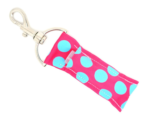 Bubble Pop Bliss – Fuchsia Pink & Baby Blue Polka Dot Lip Balm Holder Keychain

Turn up the fun with Bubble Pop Bliss, the ultimate lippy clip that’s as playful as your personality. Featuring a vibrant fuchsia pink background with adorable baby blue polka dots, this lip balm holder is the perfect mix of sweet and bold. Clip it onto your keys, bag, or backpack and keep your favorite lip balm right where you need it—cute, secure, and totally you.

Why You'll Love It:
Bright + Bold – Fuchsia and baby blue polka dots make a striking, trendy combo
Never Lose Your Lip Balm Again – Handy clip attaches easily to any bag or keyring
On-the-Go Glam – Perfect for chapstick, lip balm, or essential oils
Gift-Ready – Great for teens, tweens, and color-loving grown-ups
Product Details:

Dimensions: Approx. 6.5" x 1.5"

Material: High-quality printed fabric

Clip Type: Durable silver key ring

Includes: 1 Bubble Pop Bliss lip balm holder (lip balm not included)

Handmade with love by Gettin Lippy in the USA