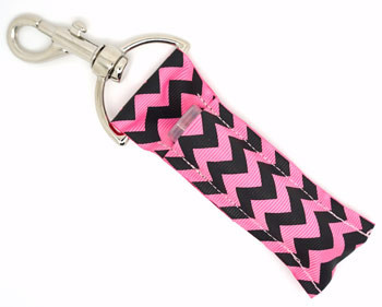 Boldly Blush – Pink & Black Chevron Lip Balm Holder Keychain

Add a fierce pop of feminine flair with Boldly Blush, the lip balm holder that blends bold style with everyday function. Featuring a striking pink and black chevron design, this keychain pouch is perfect for anyone who loves fun fashion with a confident edge. Keep your chapstick close and your vibe fierce—wherever life takes you!

Why You’ll Love It:
Eye-Catching Design – Bright pink + bold black chevron = major style points
Never Lose Your Lip Balm Again – Easily clips to keys, bags, or backpacks
High-Quality Feel – Durable, soft high-quality printed fabric
Great Gift Idea – A fab find for teens, teachers, or anyone who loves bold accessories
Functional Fashion – A stylish addition to any on-the-go lifestyle
Product Details:

Size: Approx. 6.5" x 1.5"

Material: High-quality printed fabric

Includes: 1 Boldly Blush lip balm holder (lip balm not included)

Handmade with love by Gettin Lippy in the USA