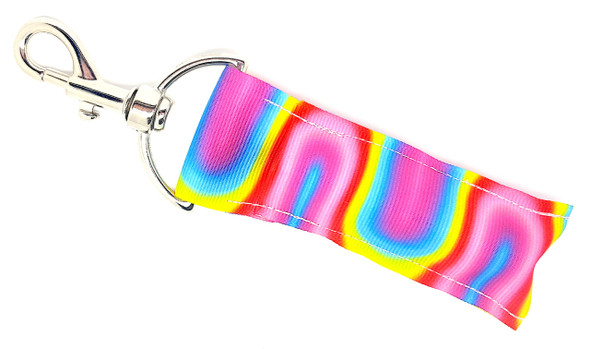 Rainbow Lava – Swirled Lava Lamp Lip Balm Holder Keychain

Groovy, bold, and bursting with color! The Lava Lippy brings retro vibes to your daily essentials with a mesmerizing swirl of pinks, teals, blues, yellows, and reds—just like a lava lamp in motion. This lip balm holder is the perfect splash of fun for those who love a little color chaos and funky flair. Clip it on and turn heads everywhere you go!

Why You’ll Love It:
Psychedelic Style – Inspired by the classic lava lamp look
Color Explosion – Vivid swirls of pink, teal, blue, yellow & red
Retro Yet Practical – Funky design meets everyday convenience
Great Gift – For teens, retro lovers, or 70s & 90s nostalgia fans
Product Details:
Size: Approx. 6.5" x 1.5"
Material: High-quality printed fabric
Includes: 1 Lava Lippy lip balm holder (lip balm not included)

Handmade with love by Gettin Lippy in the USA