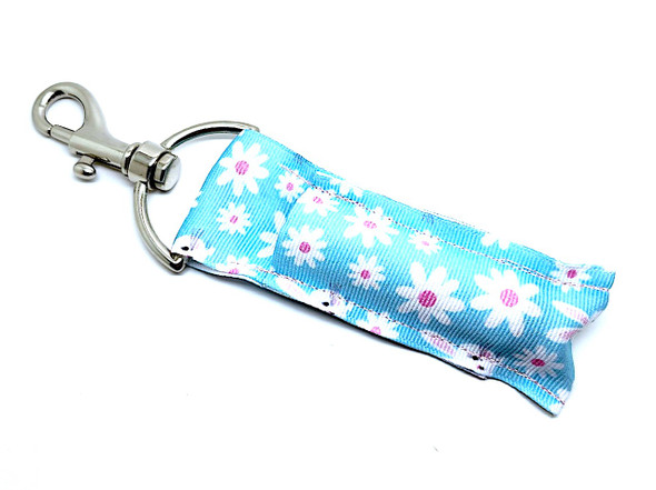 Easter Daisy & Bunny Lip Balm Holder 

Keep your lip balm stylishly secure with our Easter Daisy & Bunny Lip Balm Holder! This adorable holder features a beautiful blue background covered in white daisies with pink centers and playful bunnies, making it the perfect springtime accessory for Easter lovers of all ages.

Designed to keep your lip balm safe, accessible, and oh-so-cute, this must-have holder clips easily to keys, purses, backpacks, or Easter baskets for on-the-go convenience!

Why You’ll Love It
Never Lose Your Lip Balm Again

Tired of digging through your bag for your lip balm? Our Easter Lip Balm Holder keeps it secure and within reach! The swivel-head clasp easily attaches to your keys, purse, backpack, or lanyard, so you’ll never misplace it again.

Adorable & Functional Design

The whimsical bunny and daisy pattern adds a fun Easter-themed touch to your everyday essentials. Whether for yourself or as a thoughtful Easter gift, this cute and functional holder is a must-have!

Handmade Quality

Proudly handmade in the USA, this durable lip balm holder is crafted with precision and care for long-lasting use.

Perfect Easter Basket Stuffer

Looking for a fun and practical Easter gift? This Easter Daisy & Bunny Lip Balm Holder makes the perfect basket filler for:


Easter Gifts for Kids & Teens
Spring Birthdays
Friends, Daughters, Nieces & Teachers
Anyone who loves cute & functional accessories!

Buy With Confidence

Our Gettin’ Lippy Lip Balm Holders are top-rated for their quality and design. We stand behind our product with a 100% Money-Back Guarantee. If you’re not completely satisfied, we’ll refund your purchase—no questions asked!Note: Lip balm not included—check out our Easter Lip Balm Packs for the ultimate springtime duo!

Handmade in the USA

Order now and give your lip balm the cutest home this Easter!