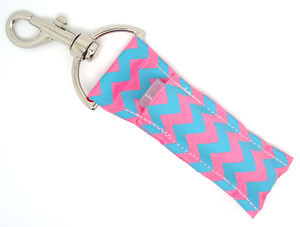 Cotton Candy Kiss – Pink & Baby Blue Chevron Lip Balm Holder Keychain

Add a splash of sweet style to your everyday with Cotton Candy Kiss, the perfectly pastel lip balm holder that’s as cute as it is convenient! Featuring a soft pink background with playful baby blue chevron stripes, this accessory is a must-have for fans of fun, feminine flair.

Whether you’re headed to school, work, or out with friends, keep your favorite lip balm close at hand—and look adorable doing it.

Why You’ll Love It:
Soft & Sweet – Pretty pink with baby blue chevron for a pastel-perfect look
Stay Organized – No more losing your chapstick at the bottom of your bag
Lightweight & Durable – Everyday accessory with major style points
Perfect for Gifting – Great for teens, girls, and pastel lovers
Fresh Vibes – A cheerful addition to backpacks, purses, or keyrings
Product Details:

Size: Approx. 6.5" x 1.5"

Material: High-quality printed fabric

Includes: 1 Cotton Candy Kiss lip balm holder (lip balm not included)

Handmade with love by Gettin Lippy in the USA