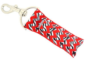 Zebra Zing – Red Chevron Zebra Print Lip Balm Holder Keychain with Silver Glitter

Add some sizzle to your style with Zebra Zing, the lip balm holder that knows how to turn heads! With a bold red background, eye-catching zebra-striped chevron in black and white, and sparkling silver glitter woven throughout, this dazzling accessory brings wild vibes and glam energy wherever you go. Clip it on your keys, bag, or backpack to keep your favorite lip balm close and your look fierce.

Why You’ll Love It:
Wild Meets Chic – Zebra-inspired chevron with a fashionable twist
Bold Red Backdrop – Eye-popping color for extra flair
Sparkling Silver Glitter – Adds glam to your everyday essentials
On-the-Go Convenience – Keep your lip balm handy and stylish
Perfect Gift Idea – Great for animal print lovers and glam queens
Product Details:

Size: Approx. 6.5" x 1.5"

Material: High-quality printed fabric

Includes: 1 Zebra Zing lip balm holder (lip balm not included)

Handmade with love by Gettin Lippy in the USA