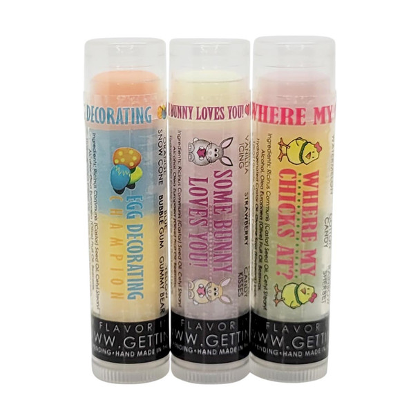Hoppy Lips – Easter 3-Pack Triple Flavor Lip Balm Set

A Little Bundle of Bunny Joy 

Gettin Lippy’s Hoppy Lips Easter 3-Pack is the perfect small gift with big flavor! Featuring one of each of our spring-inspired, triple-layered lip balms, this set is ideal for Easter baskets, classroom gifts, or springtime surprises.

Each balm offers a fun flavor journey with bold, colorful layers (just for show!), but always applies crystal clear and delivers intense moisture. These balms also pair perfectly with our lip balm holders and safety keychain wristlets, making them as practical as they are adorable.

Flavor Journey – Triple Layers of Yum:

You’ll get one balm of each flavor combo:

Egg Decorating Champion

Orange: Snow Cone

Blue: Bubble Gum

Yellow: Gummy Bear

Some Bunny Loves You!

White: Vanilla Icing

Pink: Strawberry

Purple: Candy Kisses

Where My Chicks At?

Pink: Watermelon

Yellow: Cotton Candy

Green: Rainbow Sherbet

All lip balms apply clear to the lips for a smooth, hydrated finish—no tint, just flavor & fun!

Why You'll Love the Easter 3-Pack:

Triple-Layered Flavors – Three-in-one flavor excitement in every tube

Moisturizing Magic – Made with Castor Seed Oil, Olive Fruit Oil, and Beeswax

Non-Sticky Formula – Soft, satin finish without the tacky feel

Gift-Ready – The perfect size for party favors or Easter baskets

Eco-Friendly & Cruelty-Free – No harsh chemicals, made in the USA

Perfect Pairing – Designed to fit our lip balm holders and safety wristlets

Great For:

Filling Easter baskets for kids, teens, and adults

Gifting to teachers, coworkers, or classmates

Pairing with Gettin Lippy lip balm holders for a coordinated look

Adding to safety keychain wristlets for extra flair and function

Small Pack, Big Value!

Get the best of all three flavor combos in one cute 3-pack—whether you’re keeping them all or sharing the love, your lips (and your friends) will thank you!

MADE IN THE USA!!