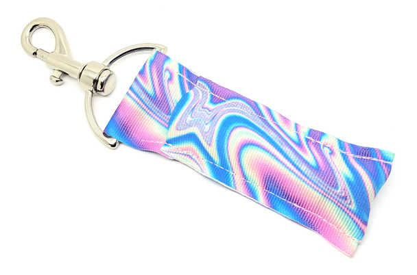 Pastel Rave Lip Balm Holder – Color Your Day in Style

Turn up the volume on your everyday essentials with our Pastel Rave Lip Balm Holder! Featuring a dreamy mix of purple, pink, blue, green, and yellow in a soft, swirling pattern, this holder gives you festival vibes with a pastel twist. It’s bright, fun, and functional—perfect for spring days, summer festivals, or anyone who loves playful accessories.

Clip it to your bag, keys, or backpack and never lose your lip balm again!

Why You’ll Love It

Never Lose Your Lip Balm Again
Say goodbye to the bottom-of-the-purse struggle. Our secure swivel clasp makes it easy to keep your lip balm close at hand—just clip and go!

Vibrant Pastel Swirl Design
The color combo is EVERYTHING! With soft purple, pink, blue, green, and yellow blended in a dreamy, rave-inspired print, this holder is a must-have for color lovers.

Handmade with Love in the USA
Each holder is made with care using high-quality materials. Durable, cute, and ready to brighten your every day.

Perfect Gift for Any Occasion
Ideal for birthdays, party favors, springtime gifts, or just because. This pastel beauty is perfect for teens, tweens, and adults who adore colorful flair.

Product Details

Dimensions: 6.5 inches (with hook) x 1.5 inches

Material: Durable neoprene with a swivel-head keyring clasp

Fits most standard lip balm tubes

Lip balm not included

Buy with Confidence

Our lip balm holders are top-rated for their durability, design, and functionality. Backed by a 100% Money-Back Guarantee, you can shop with total confidence!

Add Color to Your Day – Order Now!

Whether you’re dancing through the day or just need a pop of color, the Pastel Rave Lip Balm Holder is your go-to vibe-lifter. Grab yours now and get rave-ready!