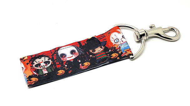 Baby Horror Villains Lip Balm Holder – Cute Meets Creepy!

Give your lip balm a frightfully fun twist with our Baby Horror Villains Lip Balm Holder! This spook-tacular holder features adorable versions of your favorite classic Halloween villains—think Jason, Freddy, Chucky, and more—all dressed as mischievous little babies!

It’s creepy and cute in all the right ways. Clip it to your keys, purse, backpack, or lanyard to keep your lip balm handy and show off your love for horror with a playful twist.

Why You’ll Love It:
Keep Your Lip Balm Close (and Creepy)

Never dig for your chapstick again! The sturdy swivel-head clasp keeps your balm upright, accessible, and looking cool.

Spooky-Cute Design

From spooky strollers to baby bottles full of mischief, this lip balm holder is packed with Halloween nostalgia and quirky horror fun. A must-have for horror fans with a sense of humor!

Handmade in the USA

Crafted with durable materials and tons of personality—this pouch is as well-made as it is hilarious.

Perfect For:

Halloween lovers & horror movie fans

Boo baskets & trick-or-treat swaps

Teen gifts, coworkers, party favors

Horror conventions & cosplay add-ons

Goth or alt accessory collectors

Spooky stocking stuffers

Buy With Confidence

Gettin’ Lippy Lip Balm Holders are top-rated for their creative designs and long-lasting quality. Love it or your money back—guaranteed!

Product Details:

Dimensions: 6.5 inches (with hook) x 1.5 inches

Includes: 1 Baby Horror Villains Lip Balm Holder

Note: Lip balm not included. Check out our Halloween-flavored balms for the perfect pairing!

Handmade with love & screams in the USA! Add it to your horror haul today!