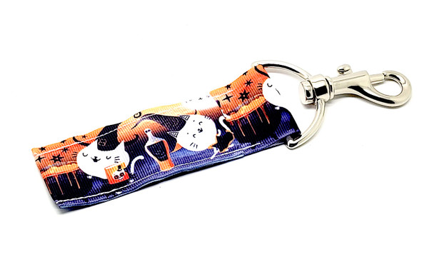 Drunk Cat Witches Halloween Lip Balm Holder

Add a wickedly fun twist to your Halloween vibes with our Drunk Cat Witches Lip Balm Holder! Featuring mischievous cats in witch hats sipping from bottles and conjuring up trouble beside a bubbling cauldron of gooey orange slime—this accessory is spooky, sassy, and downright hilarious.

Whether you’re heading to a Halloween bash, working that October aesthetic, or just a cat-lover with a wild side, this lip balm holder is a must-have fall accessory. Clip it to your keys, purse, backpack, or costume and keep your favorite Gettin’ Lippy balm handy all spooky season long.

Why You’ll Love It
Purr-fectly Spooky Design

This isn’t your grandma’s Halloween print! These drunk little witches (aka tipsy black cats) are rocking hats and chugging potions like they run the coven. Add in a cauldron full of orange slime, and you’ve got Halloween magic.

Clip & Go Convenience

No more lost lip balms! With our secure swivel hook, this holder keeps your balm upright and easy to access—attach it to keys, bags, belt loops, or broomsticks (hey, we won’t judge).

Handmade in the USA

Lovingly crafted with quality and care, this lip balm holder is built to last beyond Halloween. Durable stitching, vibrant prints, and spooky charm in every stitch.

Perfect For:

Halloween party favors & trick-or-treat handouts

Spooky season gifts for friends, teens & coworkers

Witchy vibes & costume accessories

Cat lovers with a wild side

Adding some humor to your fall essentials

Buy With Confidence

We stand by the quality of our Gettin’ Lippy Lip Balm Holders with a 100% Money-Back Guarantee. If you’re not obsessed, we’ll refund your purchase—no black magic required!

Product Details:

Dimensions: 6.5 inches (with hook) x 1.5 inches

Includes: 1 Drunk Cat Witches Lip Balm Holder

Note: Lip balm not included. Pair with one of our fall-flavored 3-layer balms for the ultimate spooky combo!

Handmade in the USA – Get Yours Before They Vanish!