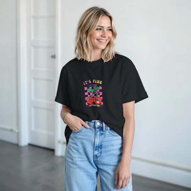 It’s Fine, I’m Fine – Everything’s Fine Double Cherries | Gildan®  T-shirt

When life gets chaotic, sometimes all you can do is laugh it off — and this tee does exactly that. The “It’s Fine, I’m Fine, Everything’s Fine” T-shirt delivers personality and humor with a bold double cherries graphic. One cherry smiles innocently, while the other gives that classic “yeah… it’s fine” look we all know too well.

Made from heavyweight cotton, this Gildan® is durable, comfortable, and perfect for everyday wear. This t-shirt offers a fun, trendy twist while still maintaining the classic feel and quality you expect from Gildan®. With its relaxed, easy-to-style fit, this tee pairs effortlessly with high-waisted denim, shorts, joggers, or skirts — making it a go-to for casual days, errands, or lounging.

The seamless double-needle collar, double-needle sleeves and hems, and taped neck and shoulders add long-lasting structure, ensuring your favorite funny tee holds up wash after wash. Fabrication varies slightly by color to deliver the ideal blend of comfort and durability:

Solid Colors: 100% preshrunk cotton

Ash Grey: 99% Airlume combed cotton / 1% polyester

Sport Grey: 90% cotton / 10% polyester

Heather Colors: 50% cotton / 50% polyester

Available in Black, Dark Heather, Graphite Heather, Navy, and White, and inclusive sizes S–5XL, this crop top is perfect for anyone who loves humor, bold graphics, and a little sass in their wardrobe.

Features

Bold + playful double cherries design

“It’s Fine, I’m Fine, Everything’s Fine” quote

Heavyweight cotton for durability

Trendy length with a relaxed unisex fit

Seamless double-needle collar + reinforced stitching

Available in 5 colors

Sizes S–5XL
