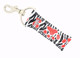 Paw-sitive Vibes Red Glitter Paw Zebra Stripe Lippy Clip

Make a bold statement with Paw-sitive Vibes – a fierce, fun, and functional lip balm holder from Gettin Lippy! Featuring a wild white and black zebra-striped background, this design roars with personality thanks to large glittery red paw prints running down the middle.

Perfect for animal lovers, team moms, cheerleaders, or anyone with school spirit and a love for sparkle. Keep your favorite balm close while showing off your unique style!

Why You’ll Love It:

Eye-catching red glitter paw prints
Trendy zebra stripe background
Easily clips to keys, bags, lanyards, or backpacks
Fits most standard lip balm brands
Great for gifting to pet lovers, sports fans, or yourself

Product Details:

Design: White and black zebra background with large red glitter paw prints

Material: High-quality printed fabric

Clip: Durable silver lobster clasp

Size: Designed to fit most lip balm tubes and essential oil rollers

Includes: 1 Paw-sitive Vibes lip balm holder (lip balm not included)

Handmade by Gettin Lippy with love and style in the USA