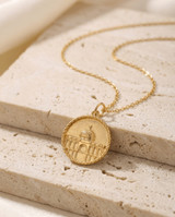 Gold Dome of the Rock heritage necklace on a neutral background