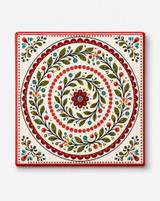 Crimson red bordered folk mandala ceramic coaster with teal, gold and green spiral pattern