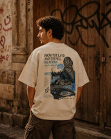 Ivory oversized t-shirt front with a small black embroidered-style outline of the map of Palestine on the chest
