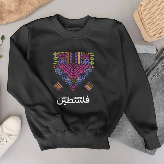 The TPFF 2024 Liberate Palestine Unisex Crewneck Sweatshirt is a must-have for those passionate about spreading awareness and supporting the cause of Palestine liberation. Made from high-quality materials, this sweatshirt is comfortable, durable, and stylish. The bold graphic design on the front makes a powerful statement, while the ribbed cuffs and waistband provide a snug fit. Available in sizes XS to 3XL, this sweatshirt is suitable for all body types. Show your solidarity and stand out in style with the TPFF 2024 Liberate Palestine sweatshirt