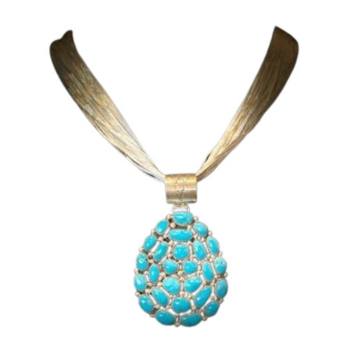 Turquoise Pendant With 50 Strand Silver Necklace