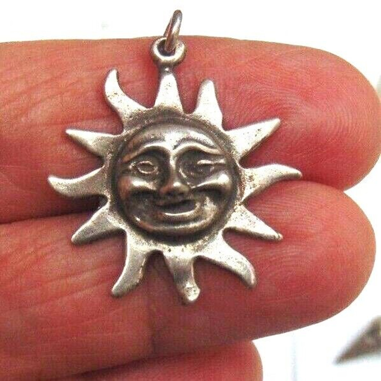 Necklace gold on silver sun charm pendant