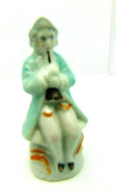 Japan Figurine Occupied Flute Player Stamped DazzleCity