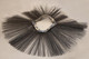 close-up of steel wire convoluted wafer broom segments for aggressive sweeping performance