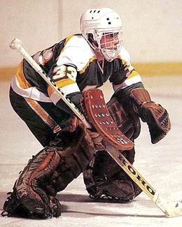 Don Beaupre of the Minnesota North Stars Alumni blocks a shot from