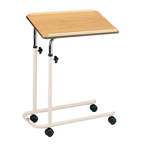 Tilting overbed table is adjustable in height and comes with swivel castors. Tilting overbed table is adjustable in height and comes with swivel castors.