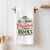 All I Want for Christmas is More Books' towel styled in gift basket with books and candle — unique Christmas gift for book lovers