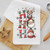 Detailed view of the colorful Christmas character stack with gifts, winter scarves, and festive accents.