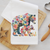 Close-up of floral bear dish towel — vibrant watercolor wildflowers filling mama bear and baby bear silhouettes sublimated on white waffle weave
