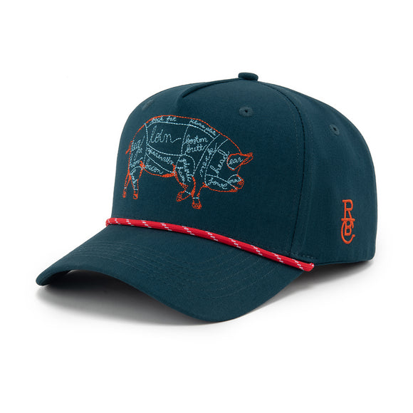 RAISED BY COYOTES PORK CUTS HAT BLUE/RED/WHITE