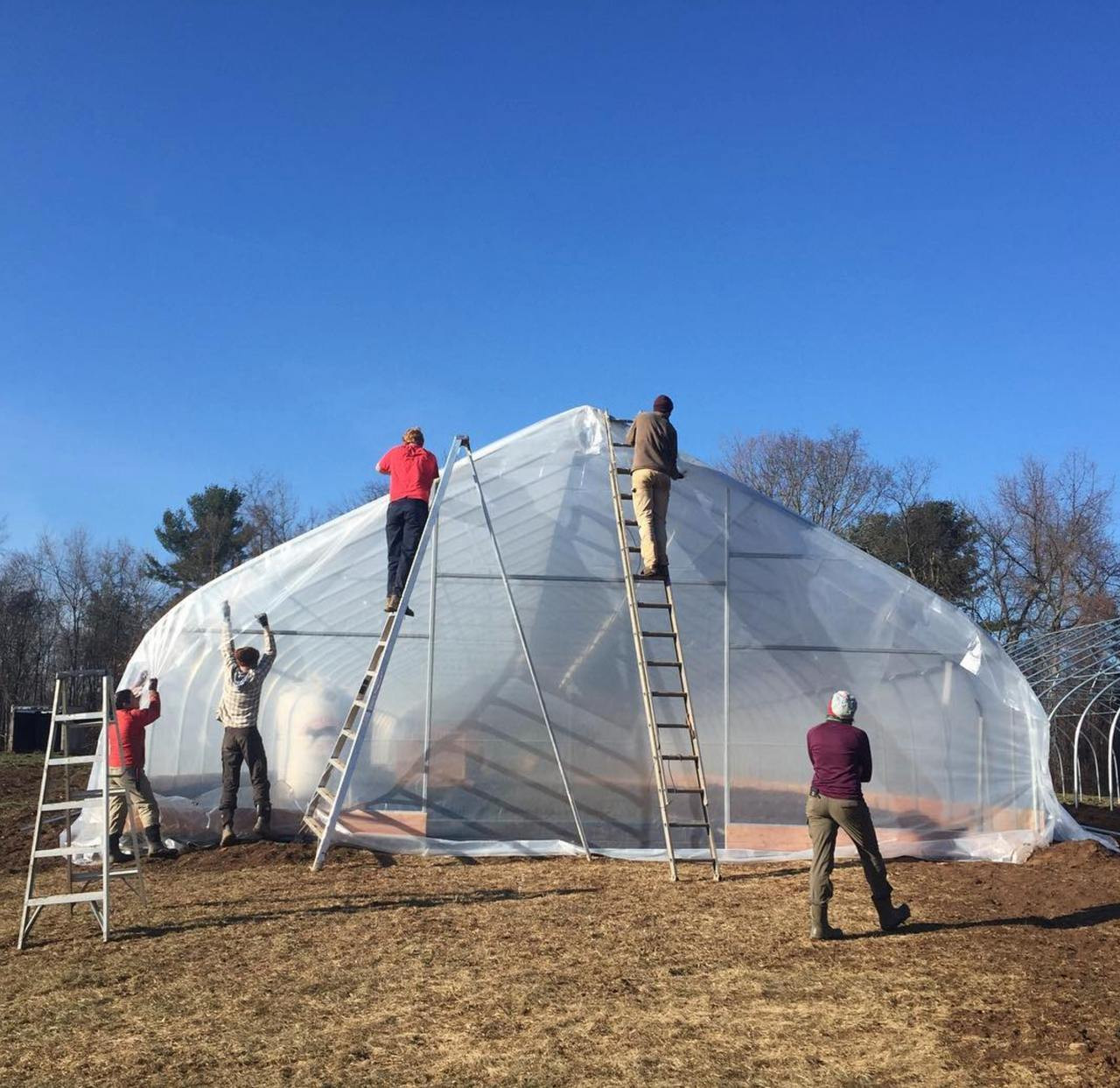 High tunnel frame construction in progress showing ease of assembly