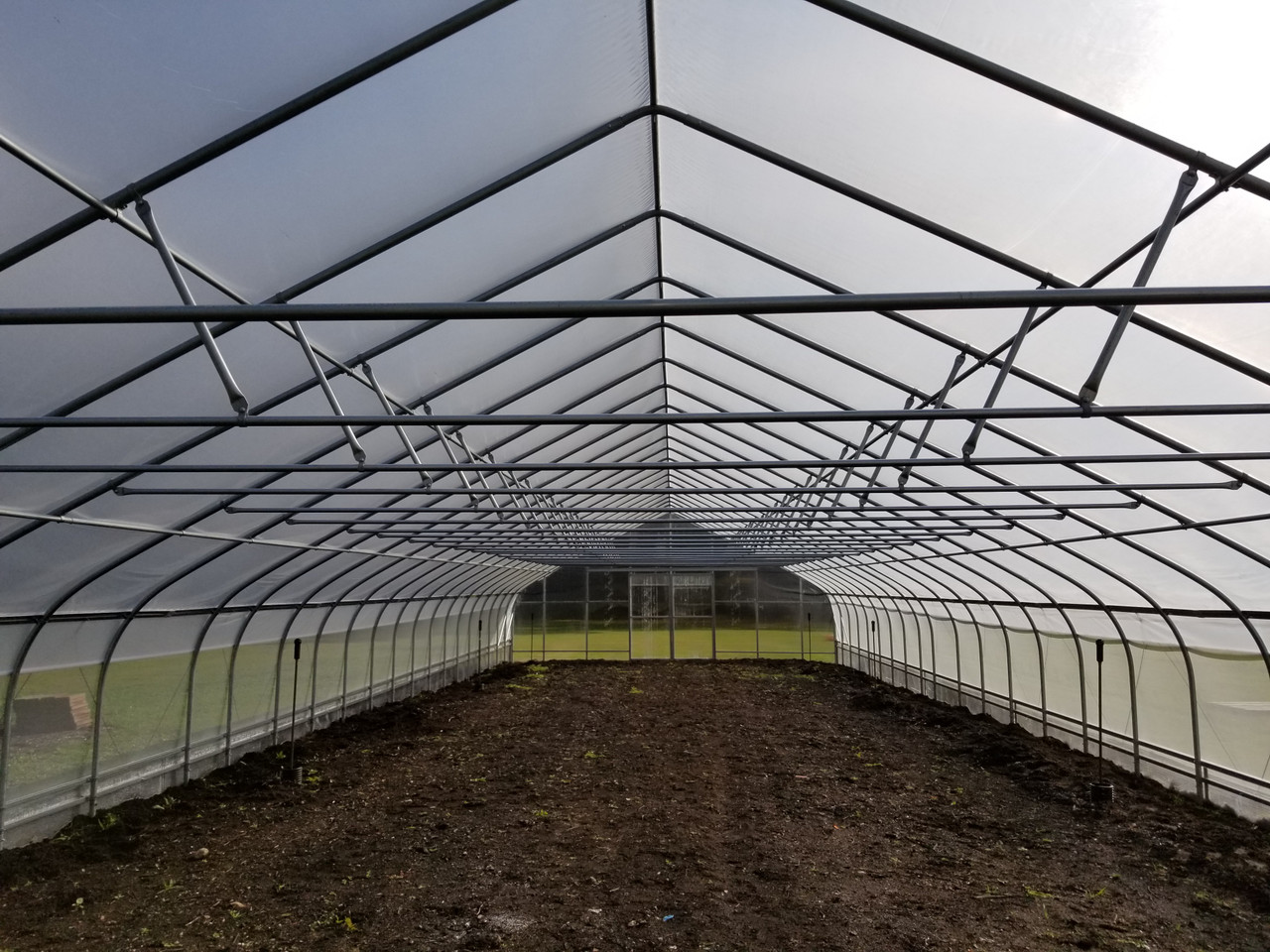 CT Greenhouse high tunnel installed on a working farm