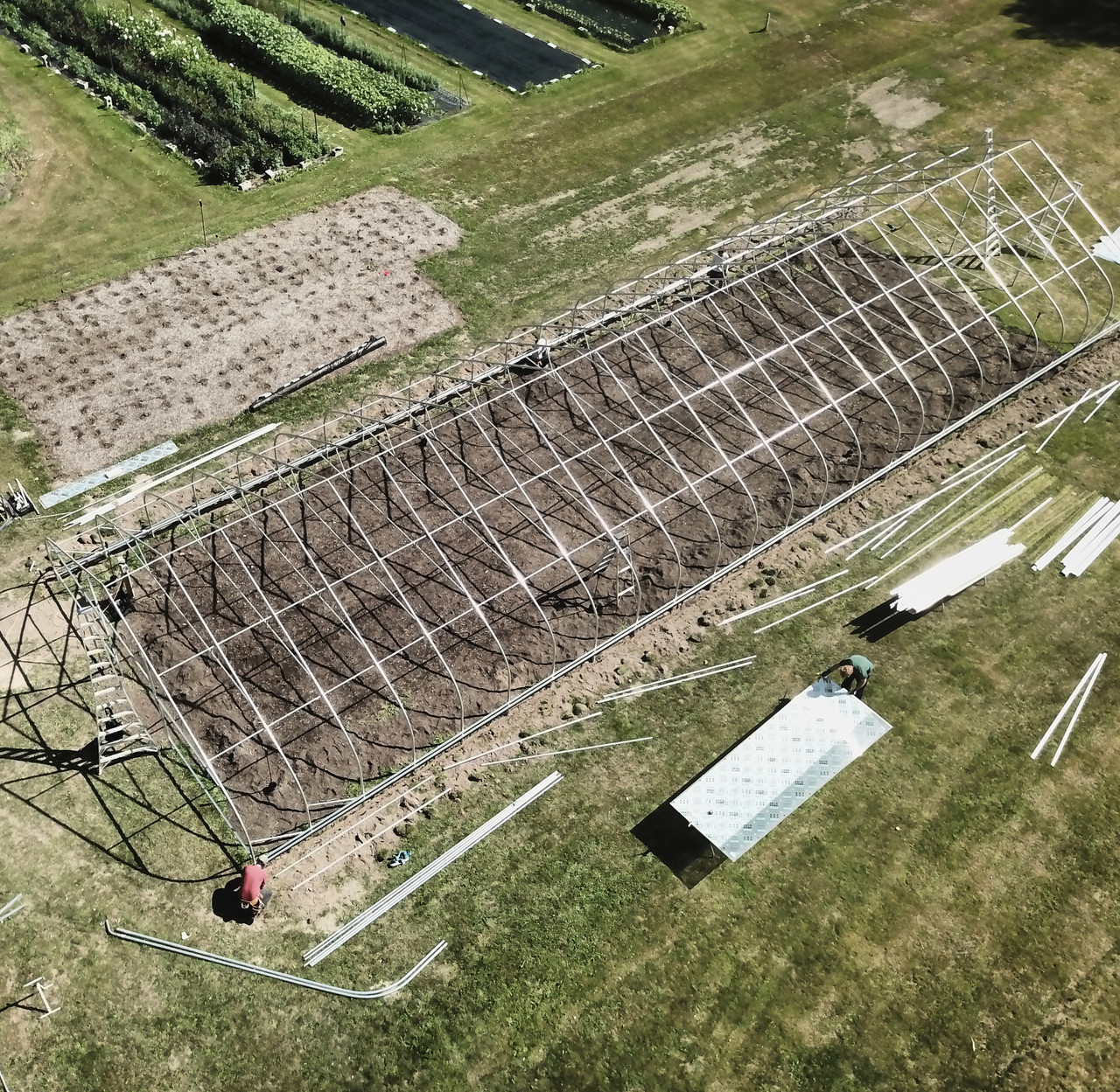 CT Greenhouse high tunnel frame Galvanized steel high tunnel frame on a farm, built to meet NRCS Conservation Practice Standard 325