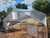 Aluminum Base and Cap to Secure Polycarbonate sheet over curved roof profiles.