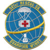 Circular embroidered patch with royal blue gridded globe, gold orbit band crossing the field, gray parachute descending from above toward a red cross at center, white figure at base, and gold scrolls reading "301st Rescue SQ" and "Guardian Wings."