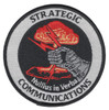 Strategic communications patch with COMM insignia and command control emblem, blue and white colors with technical operations design.