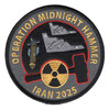 Round embroidered patch on charcoal gray background with gold text reading 'Operation Midnight Hammer' and 'Iran 2025,' featuring a B-2 Spirit bomber in gray profile, a GBU-57 bunker-buster bomb, and a gold nuclear hazard symbol inside a red hammer outline with black merrowed border.