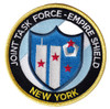 Joint Task Force Empire Shield New York circular patch with center shield showing Twin Towers Pentagon and red stars on black gold field