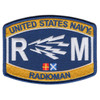 Embroidered United States Navy Radioman RM rating patch with gold and navy blue field, white lightning bolt cluster, large R and M letters, naval signal flags, and merrowed border. Measures 4.5 by 3.25 inches.
