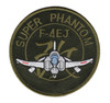 Patch showing F-4 Phantom profile with JSDF insignia and Super Phantom designation, Japanese color scheme.