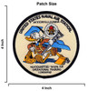 Size for Round embroidered patch with cream background and black merrowed border showing Donald Duck in blue campaign cover and brown field gear carrying a rifle, with the NAOTC crest behind him and 'United States Naval Air Station Jacksonville Florida' and 'Headquarters Naval Air Operational Training Command' text surrounding the design.