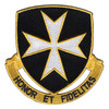 Black shield patch with a white eight-pointed cross outlined in gold, over a gold scroll reading Honor et Fidelitas, cut to the shield's outline.