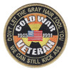 Round black Cold War Veteran patch with 1945 and 1991 beside a small American flag over a yellow and orange radiation trefoil, gold lettering DON'T LET THE GRAY HAIR FOOL YOU around the top, and a gold merrowed border.