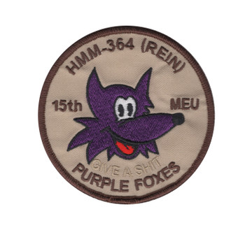 Round desert tan HMM-364 (REIN) 15th MEU Purple Foxes patch with a grinning purple cartoon fox, brown lettering and a brown merrowed border.